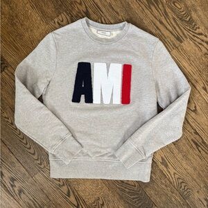 Ami Gray Sweater with Black, White, and Red Logo